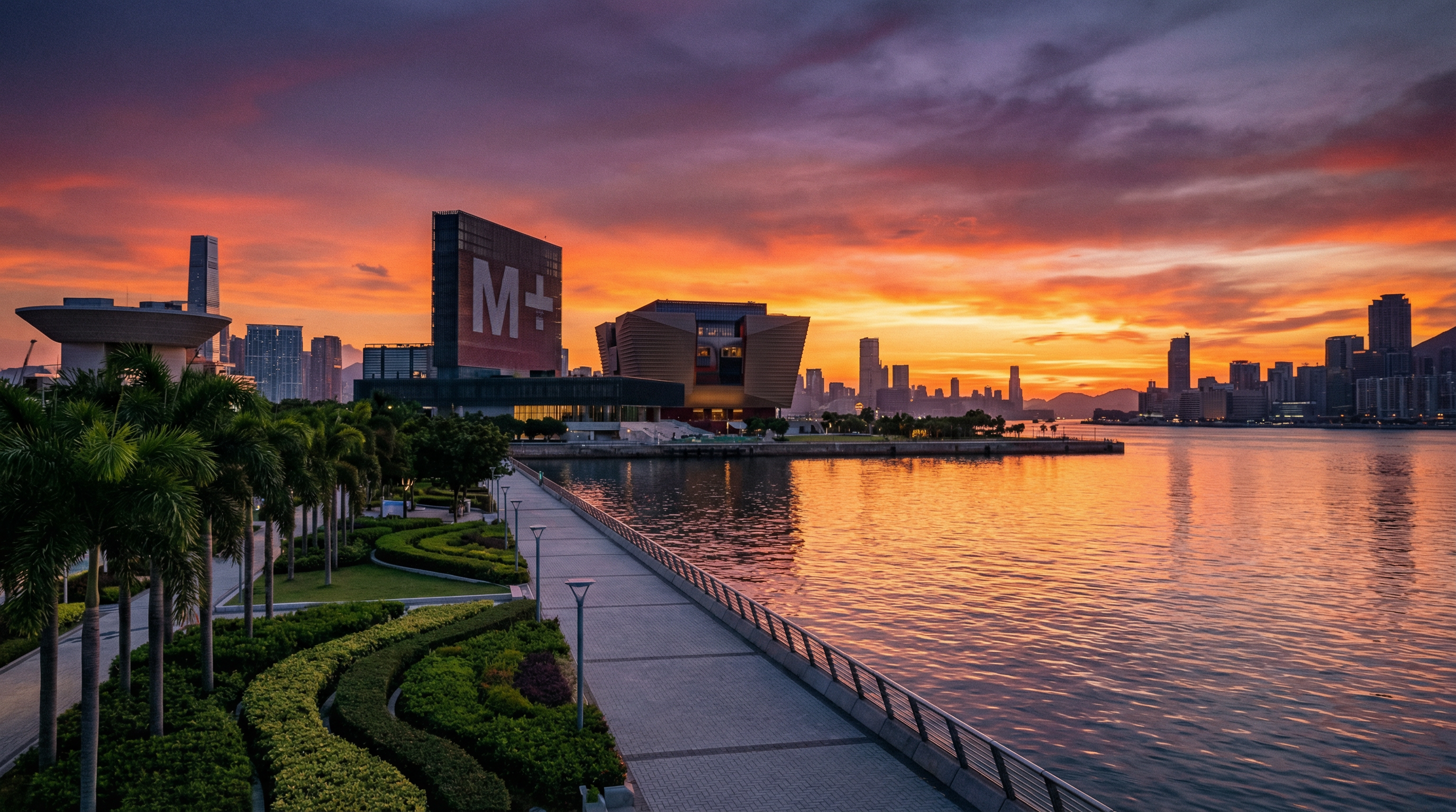 Beautiful waterfront promenade at dusk in West Kowloon Cultural District with contemporary cultural buildings reflected in calm harbour water